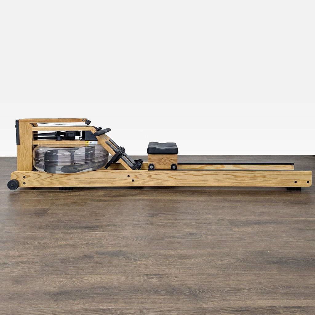 WaterRower Natural Rowing Machine made from ash wood offers smooth water resistance for home workouts.