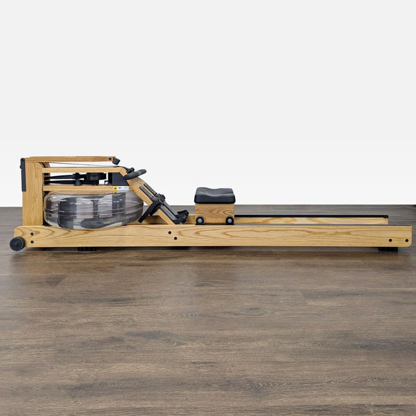 WaterRower Natural Rowing Machine made from ash wood offers smooth water resistance for home workouts.