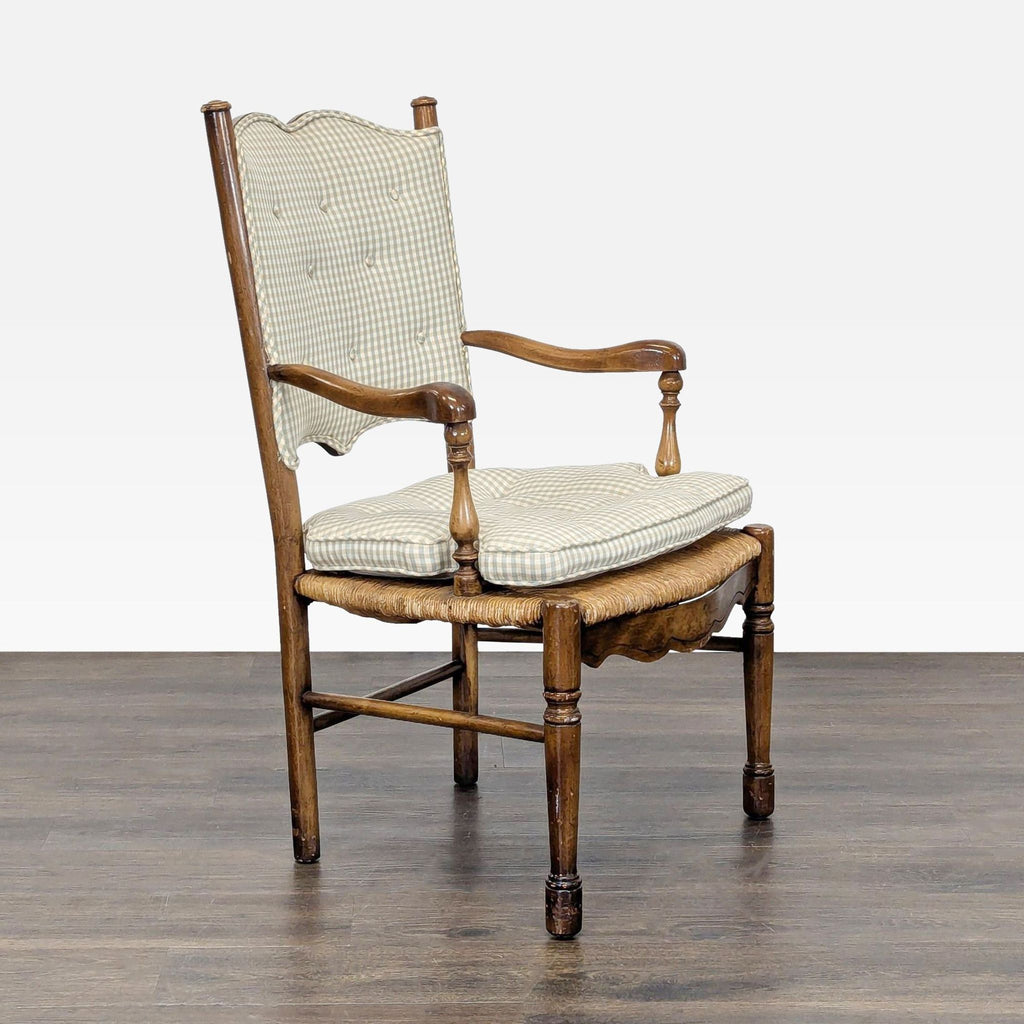 Angled view of a Country French style dining chair, showcasing its checked fabric cushions and turned wooden frame.