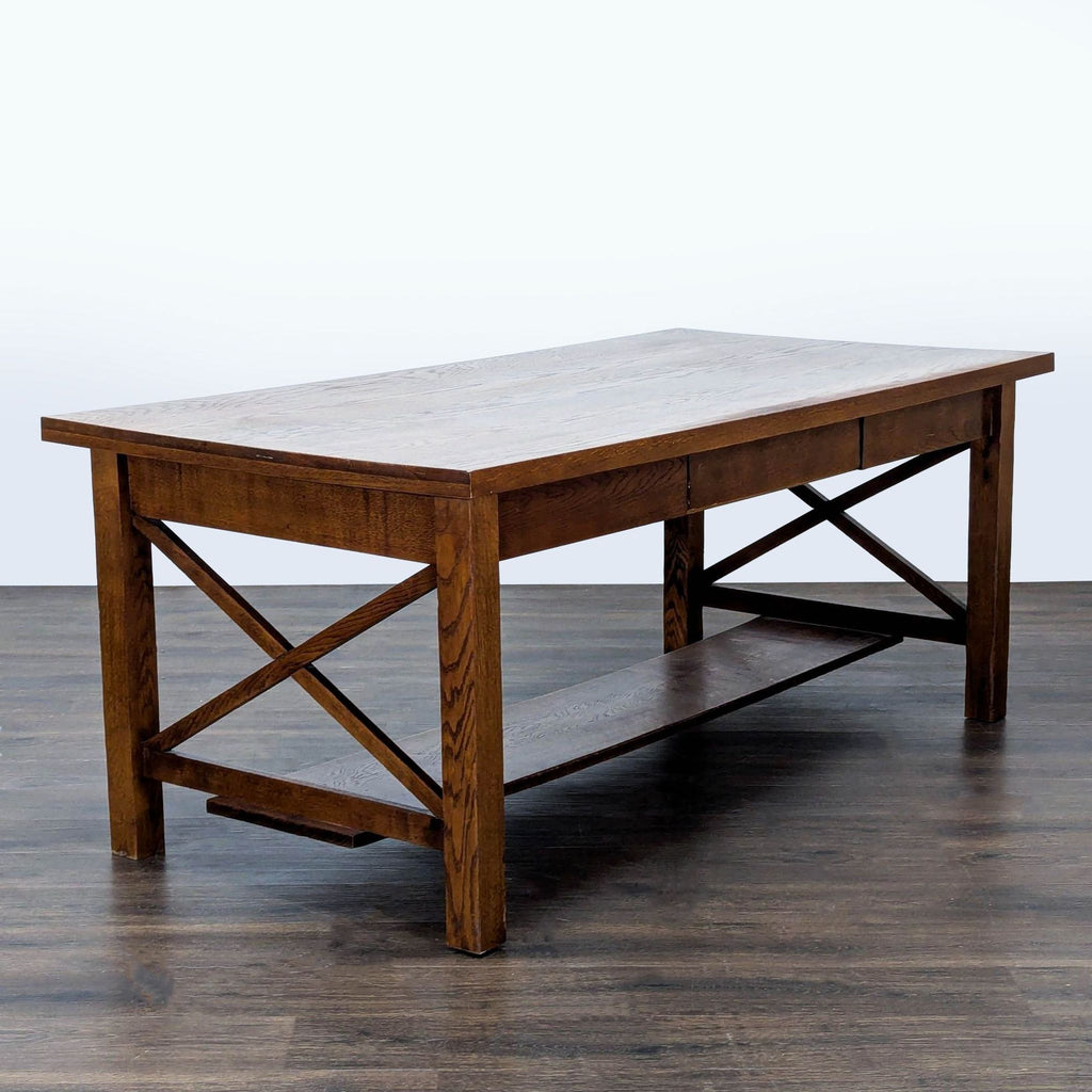 1. Rectangular wooden dining table with X-frame legs and a lower shelf, shown on a dark wood floor.