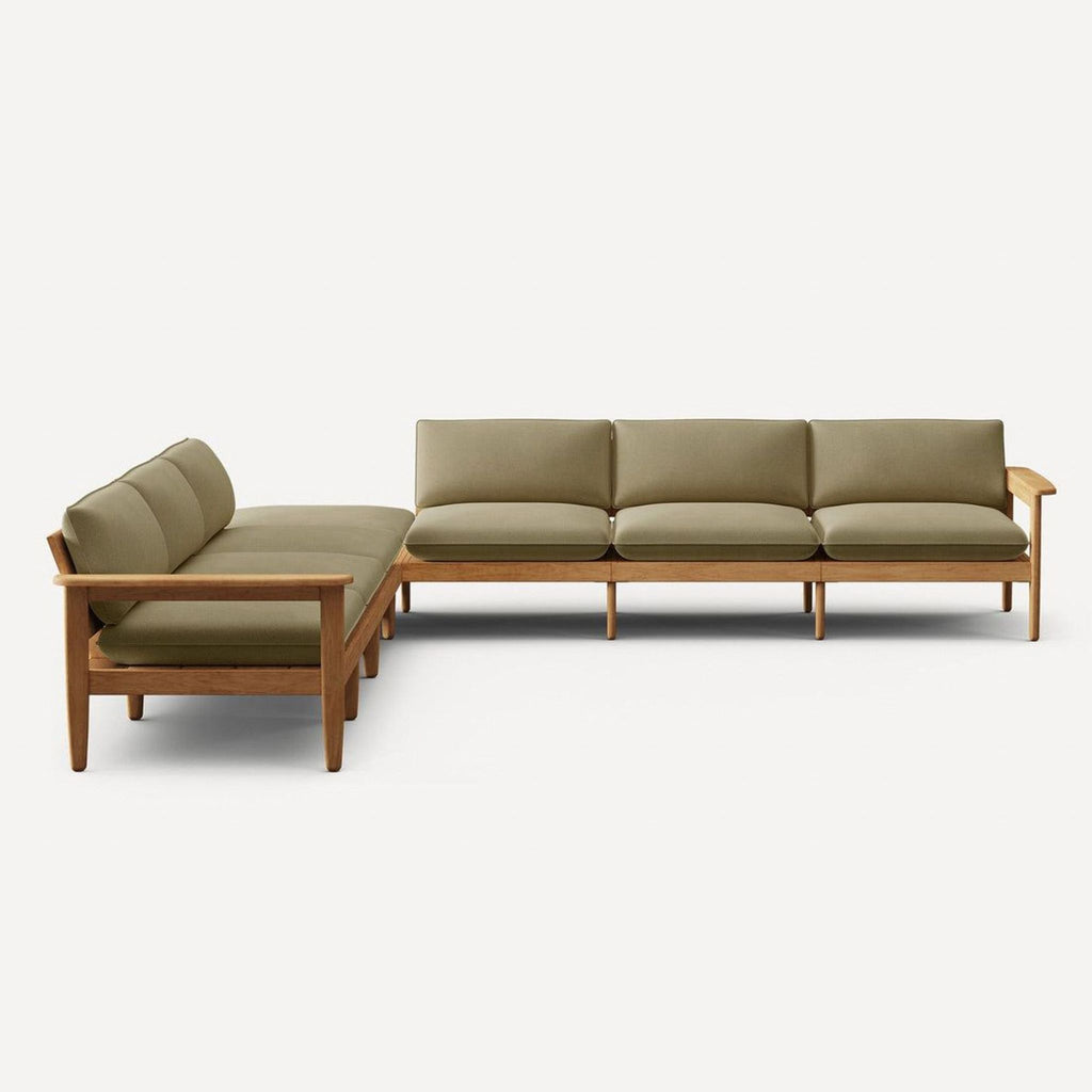 Modern L-shaped Burrow sectional sofa with neutral upholstery and spacious seating for living rooms.  