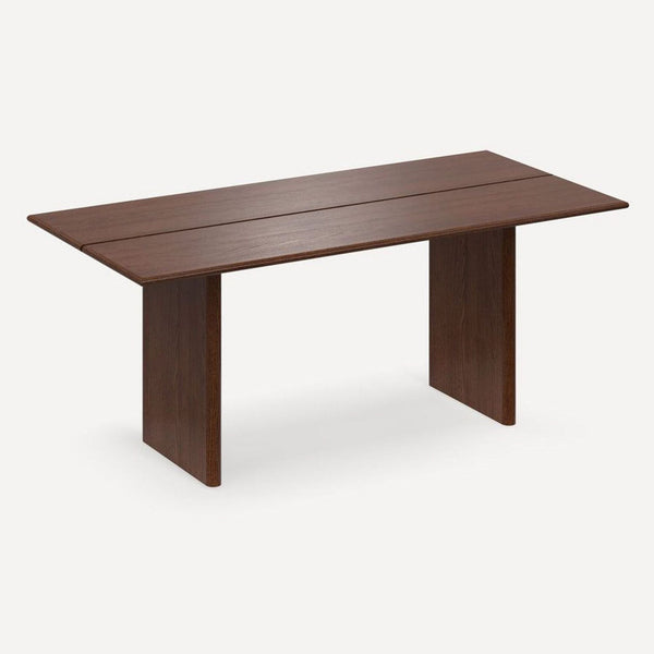Modern walnut dining table by Burrow Furniture, seats six, with a sturdy frame and durable surface.