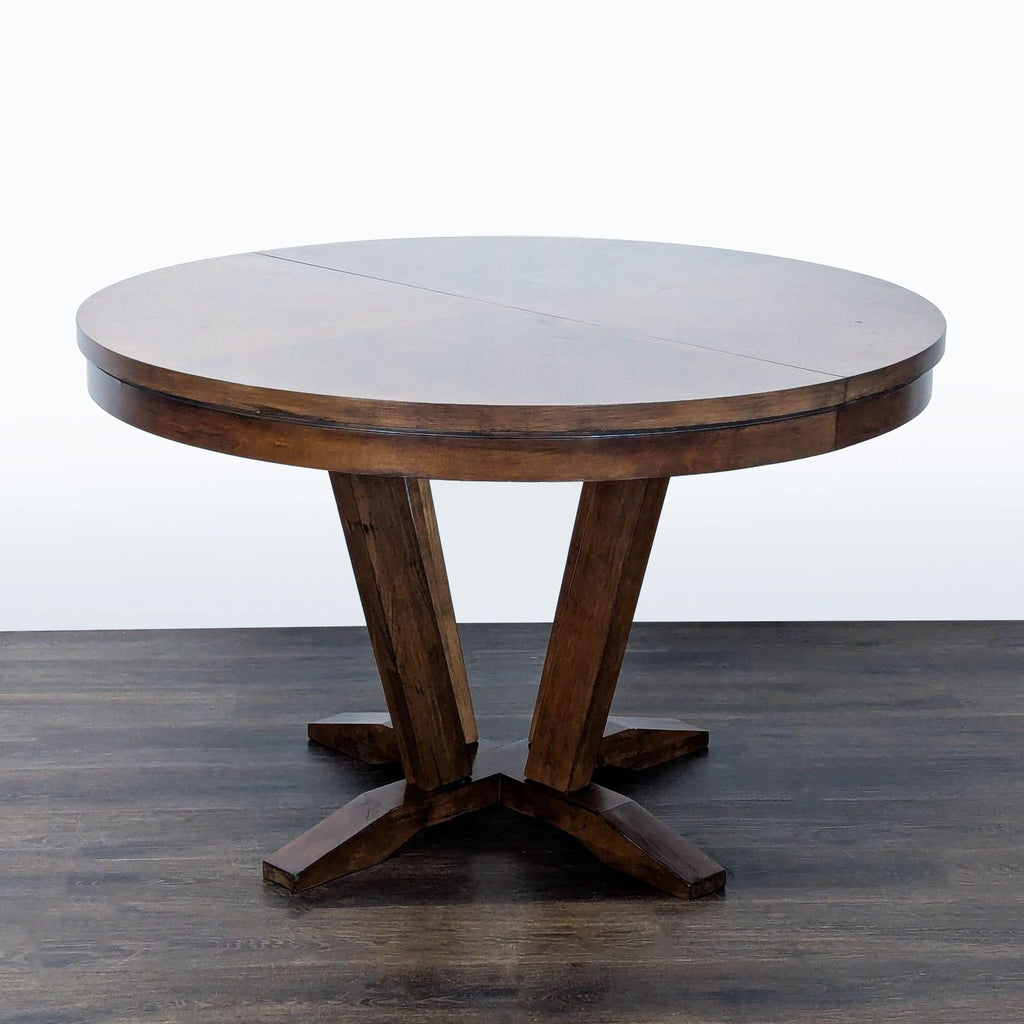 Dining table in saddle brown veneer, expandable for 4-6, Legacy Classic brand.