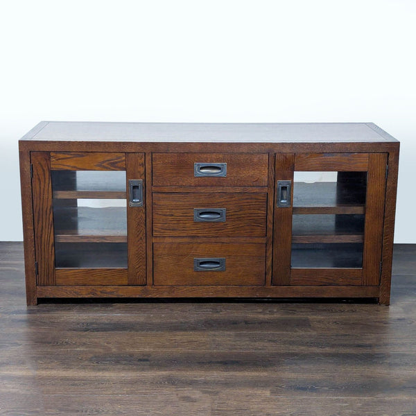 Mission style entertainment center with three drawers and two glass cabinet doors by Restoration Hardware.