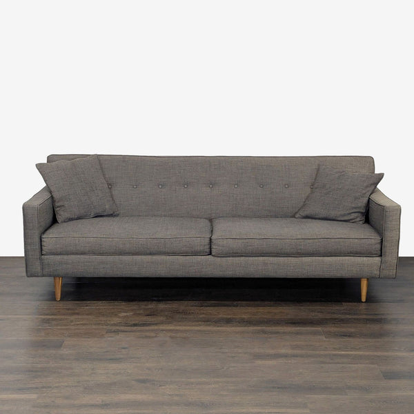 1. Modern gray 3-seat sofa with wooden legs, tufted back, two throw pillows, and easy-care fabric.