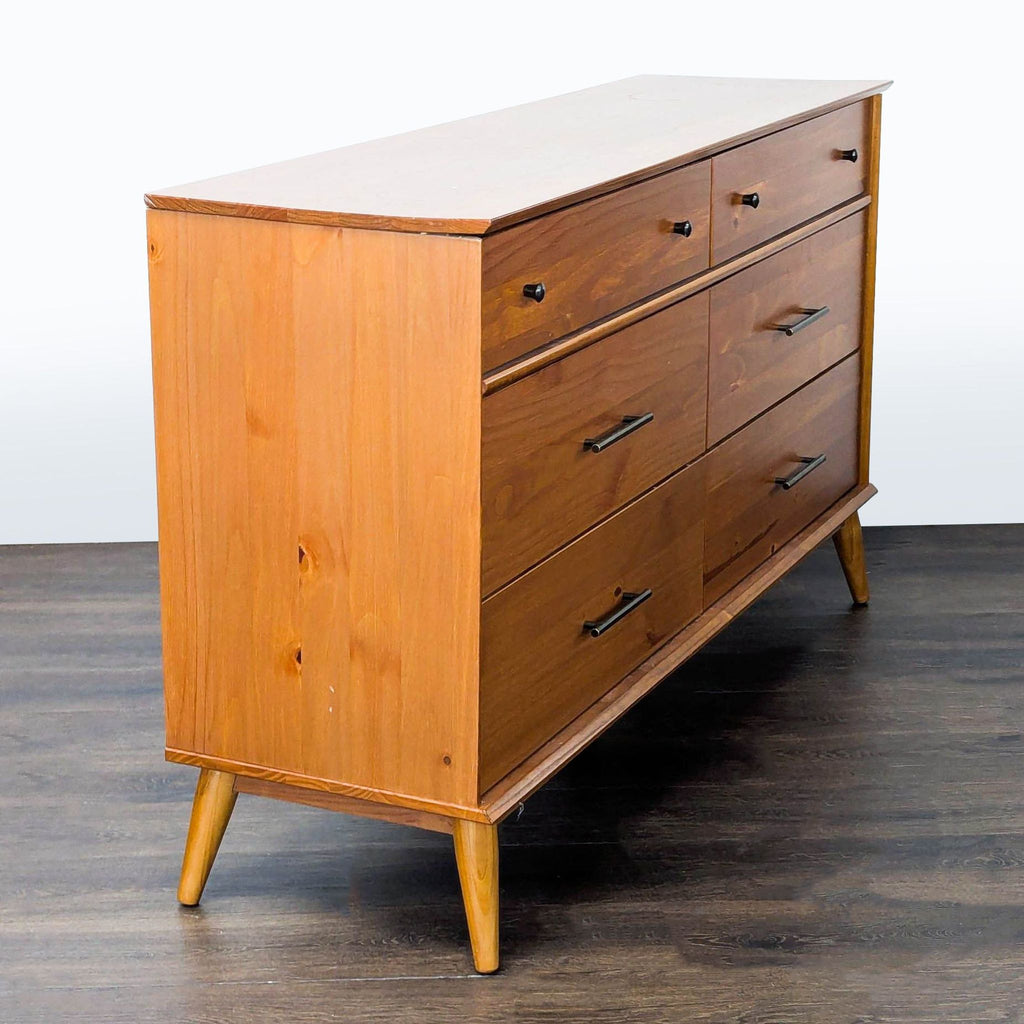 3. Angled view of AllModern wooden dresser with six drawers and metal handles, perfect for any bedroom.
