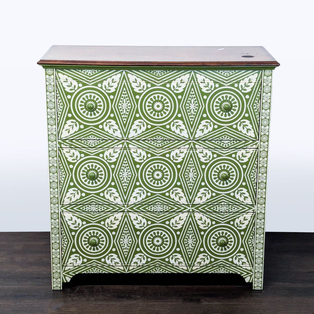 Pottery Barn dresser with green and white geometric pattern and three drawers, perfect for stylish storage.
