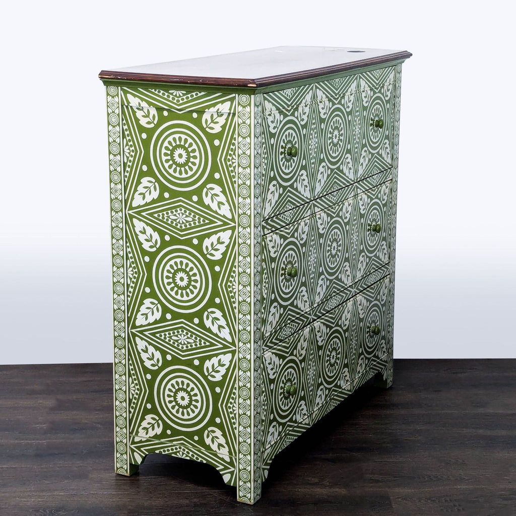 Distinctive Pottery Barn dresser with bold geometric design, three drawers, and smooth operation for storage.