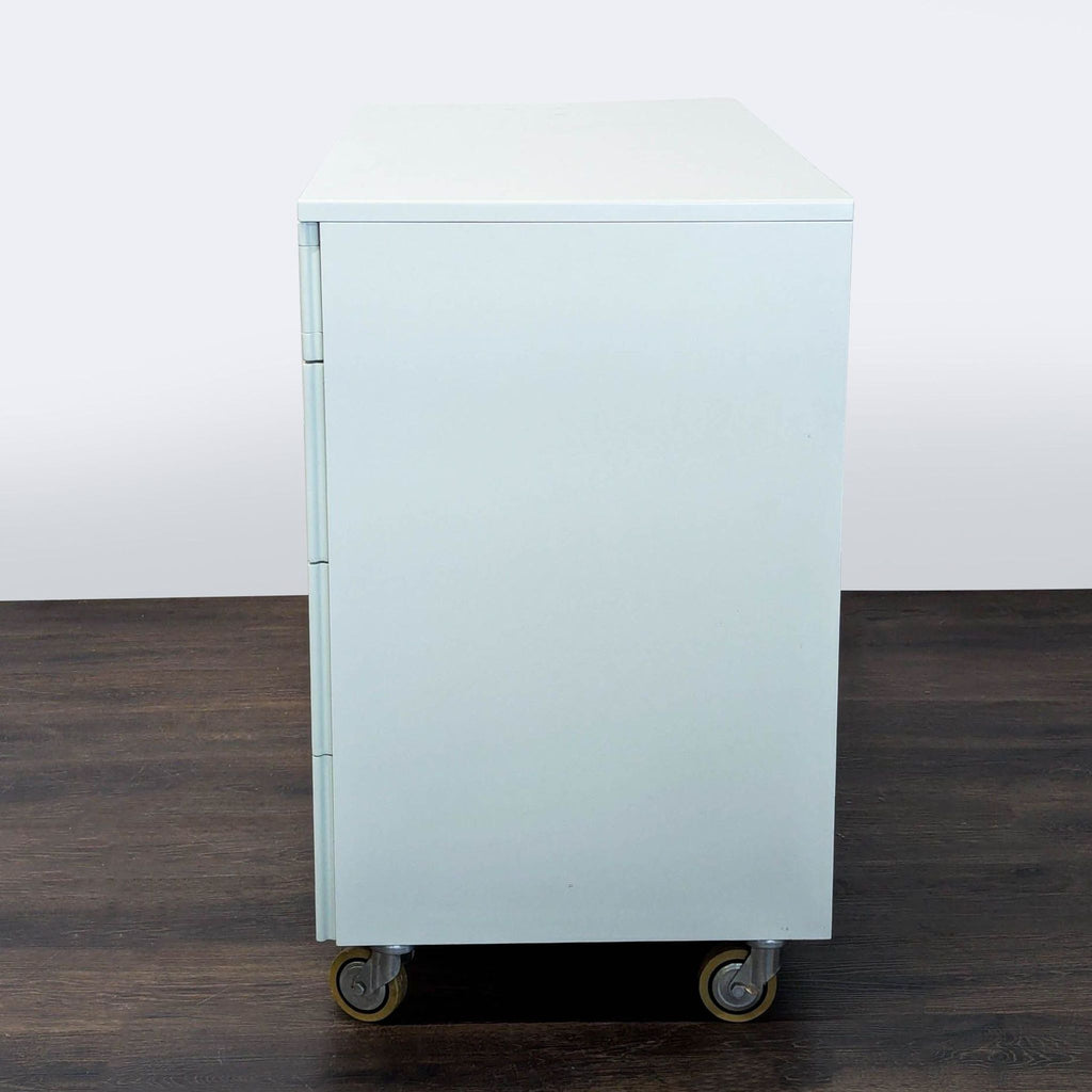 Modern White 4-Drawer Dresser with Frosted Top Drawer and Wheels