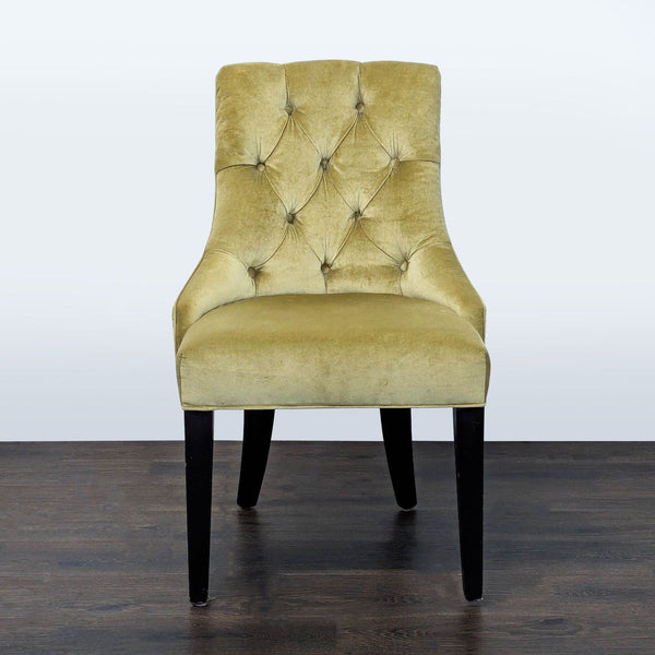 Upholstered dining chair with velvet front, cut-velvet back, and wooden legs.  