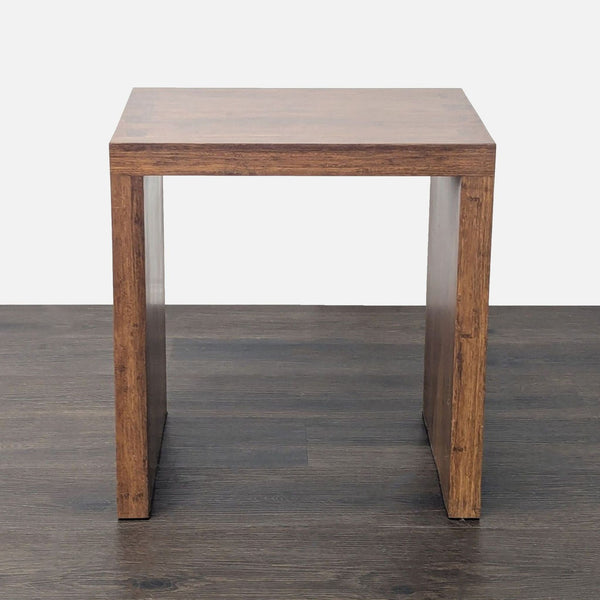 1. Minimalist wooden end table with a rectangular top and straight legs, shown on a dark floor.