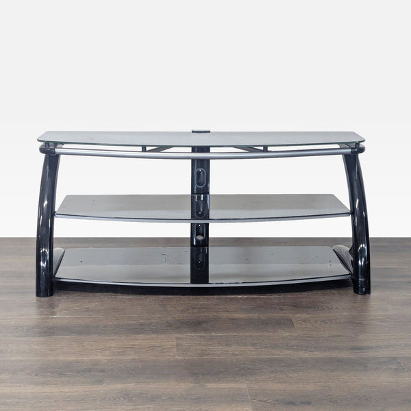 Whalen Furniture TV stand with 3-in-1 design, featuring tabletop, swivel, and wall-mount options.