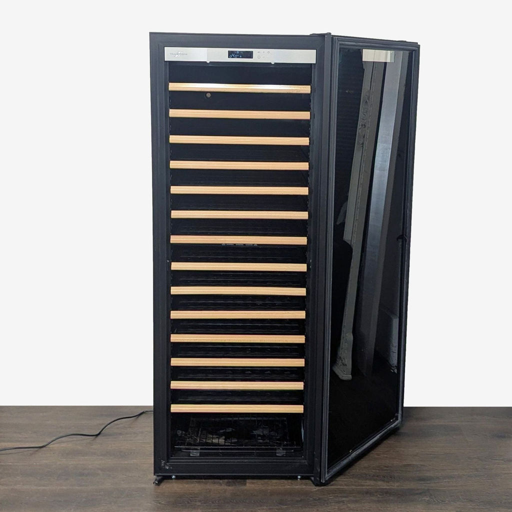 Transtherm wine refrigerator with black glass door, wooden shelves, and digital temperature display for wine storage.  