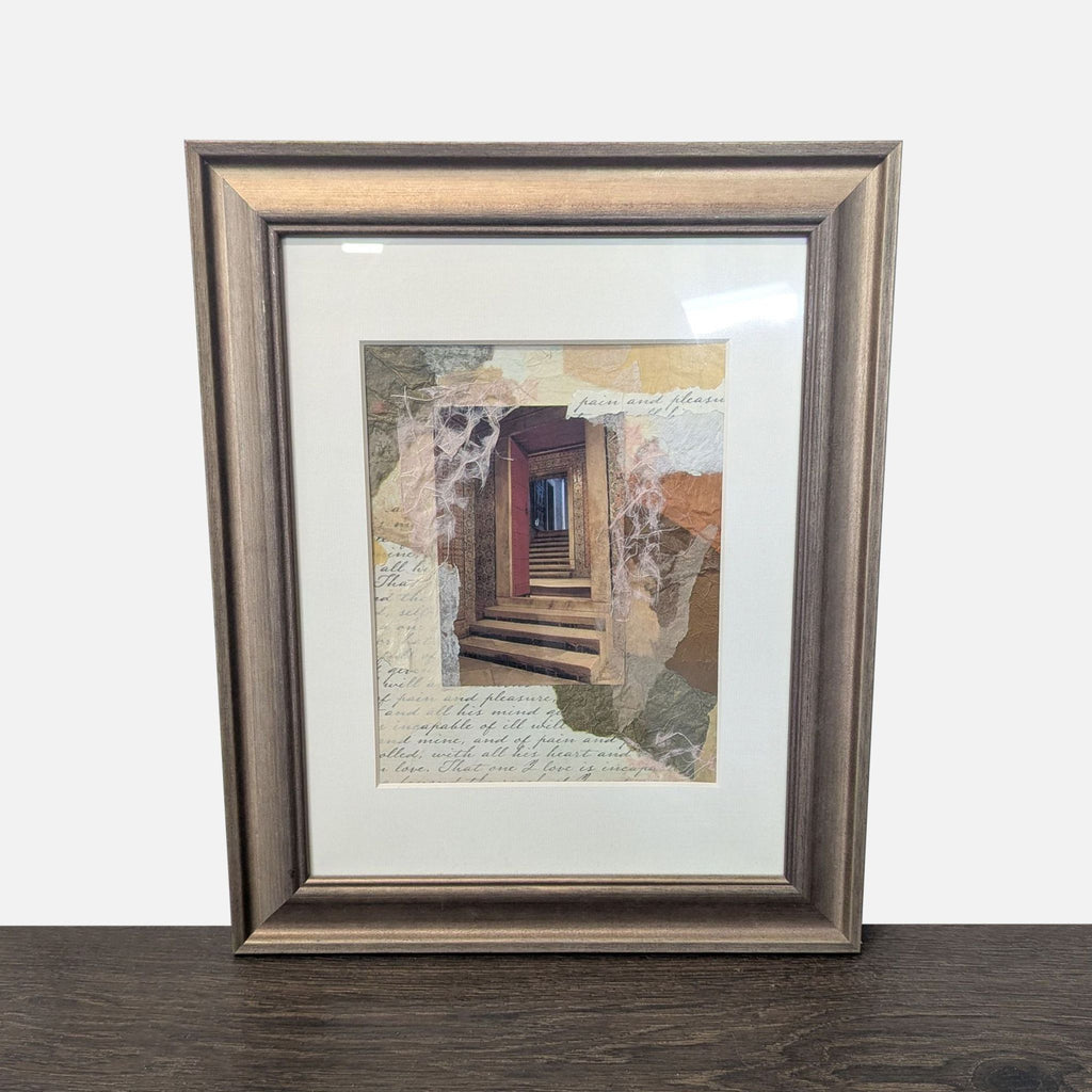 Collage art print of stairways with layered papers and script, in a wooden frame with white mat.  