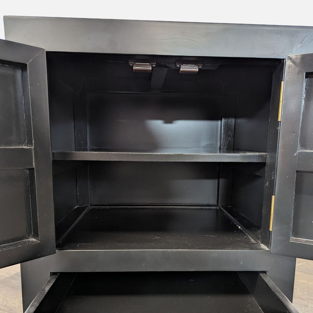 Contemporary cabinet with a shiny lacquer finish and eye-catching brass accents, ideal for stylish interiors.