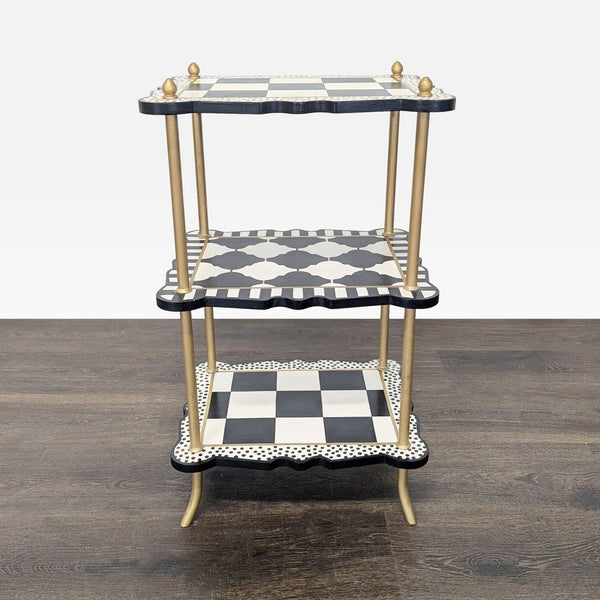 A hand-painted MacKenzie-Childs item with engineered wood and iron featuring checks, dots, and stripes.