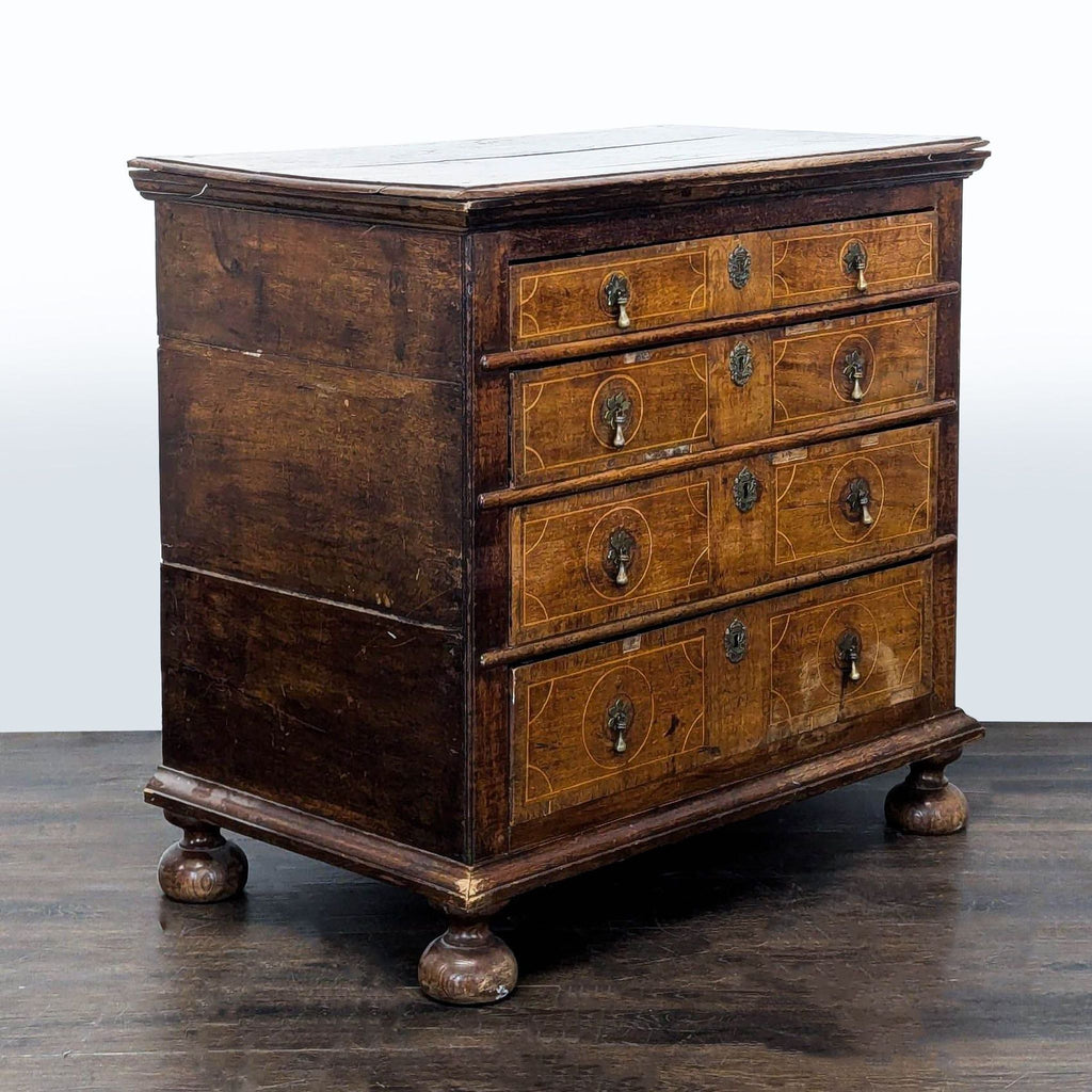 Sturdy wooden dresser with four spacious drawers and antique styling, perfect for organizing essentials.