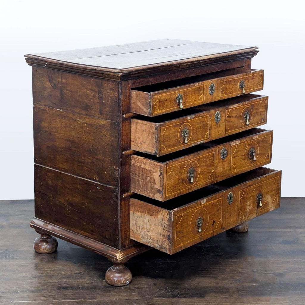 Classic dresser from the Dressers category, featuring decorative handles and elegant wood inlay details.