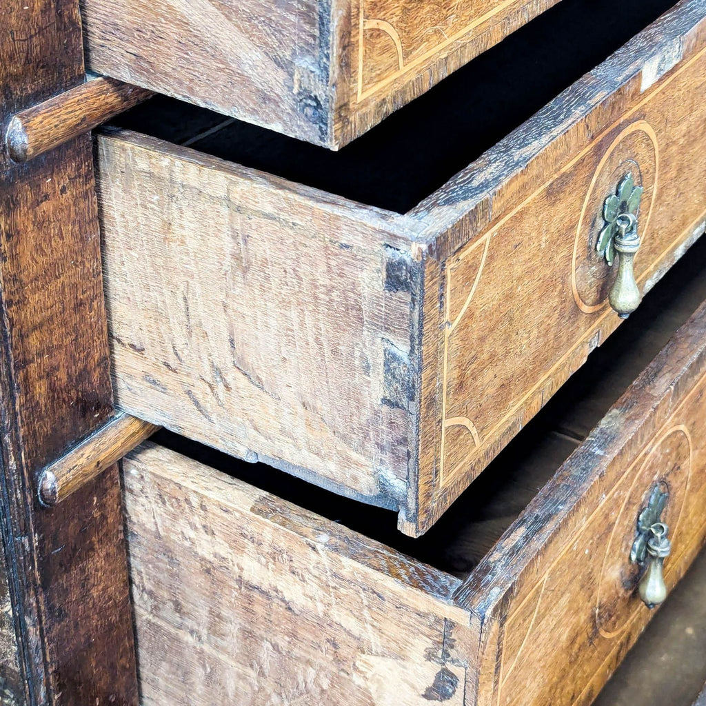 Vintage Wooden Dresser with Four Drawers and Decorative Handles