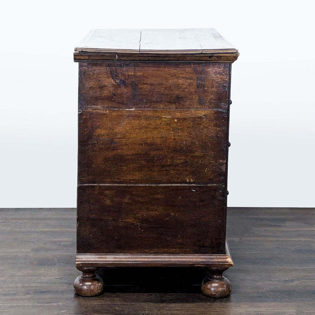 Vintage Wooden Dresser with Four Drawers and Decorative Handles