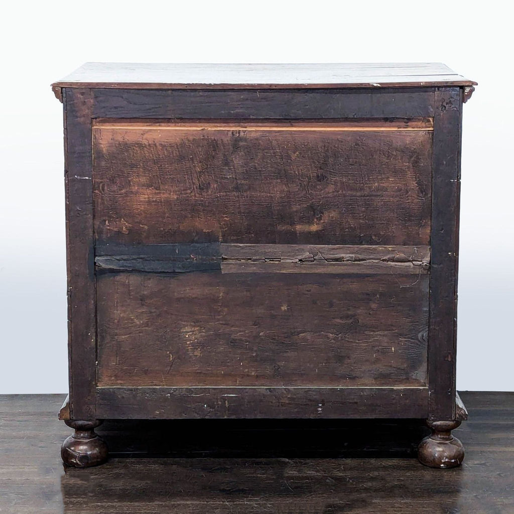 Vintage Wooden Dresser with Four Drawers and Decorative Handles