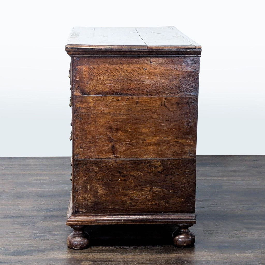 Vintage Wooden Dresser with Four Drawers and Decorative Handles