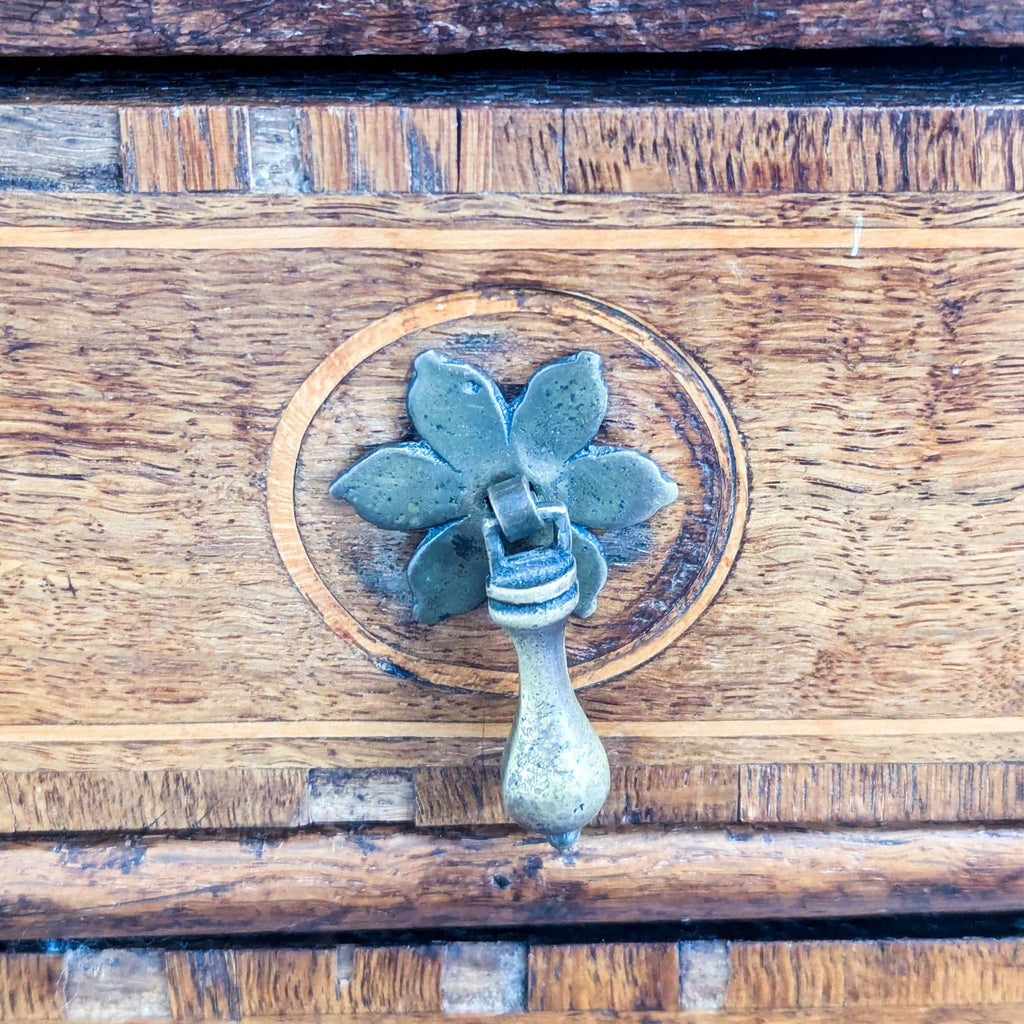 Vintage Wooden Dresser with Four Drawers and Decorative Handles