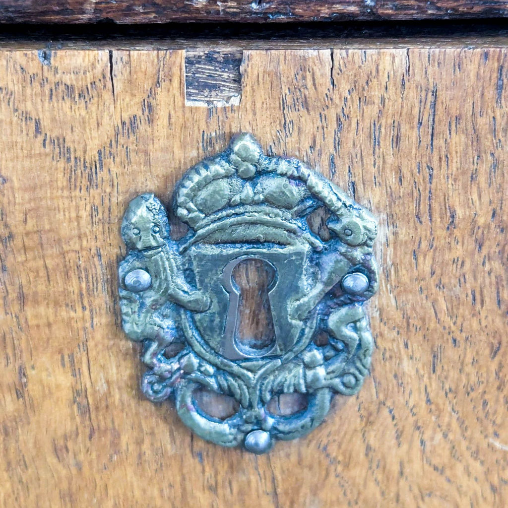 Vintage Wooden Dresser with Four Drawers and Decorative Handles