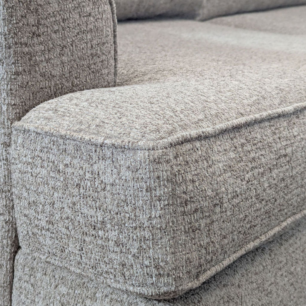 Spacious Living Spaces sectional in neutral gray upholstery, ideal for family rooms, gently used and well-maintained.