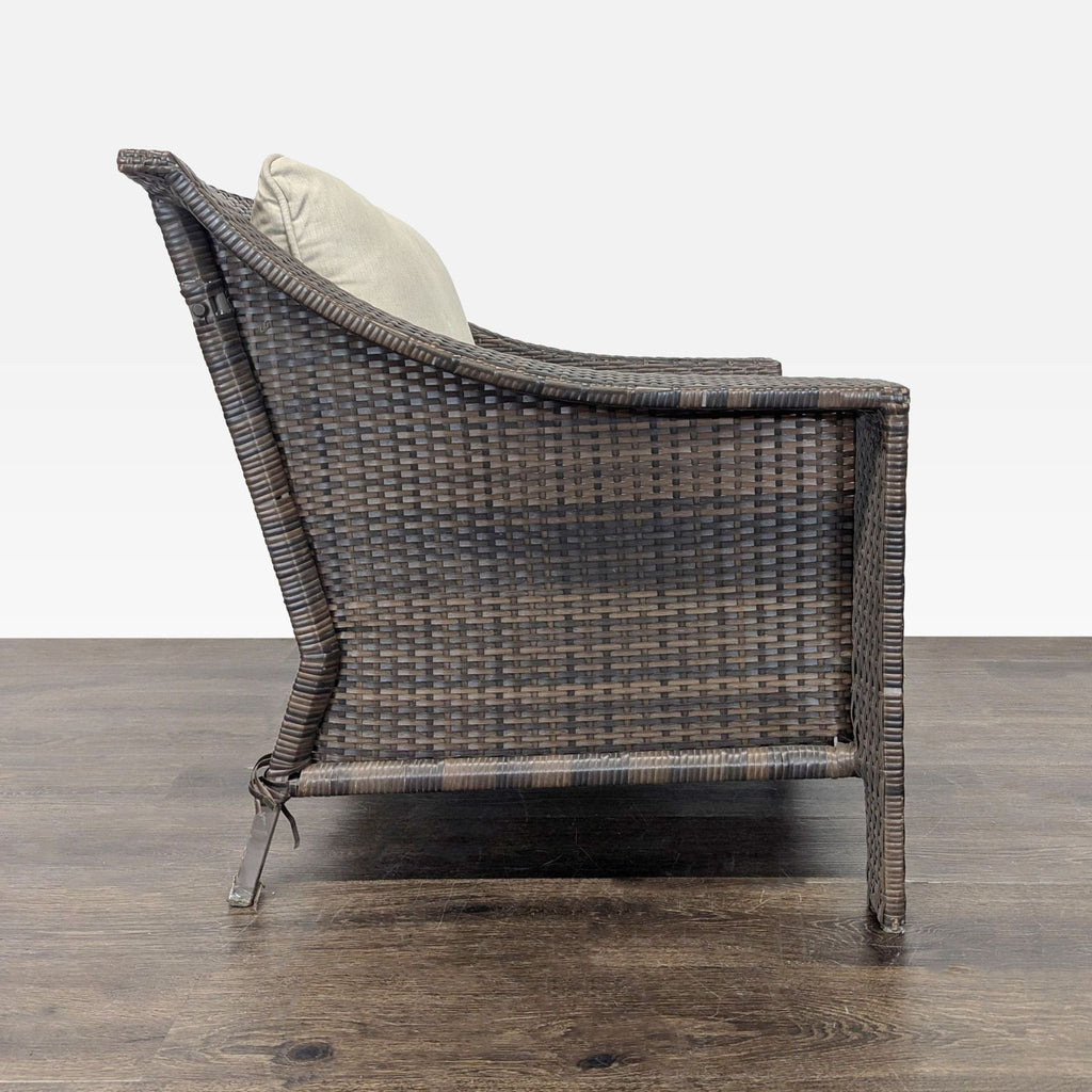 Sturdy all-weather brown wicker chair by Threshold, featuring soft beige cushions and gently used condition.