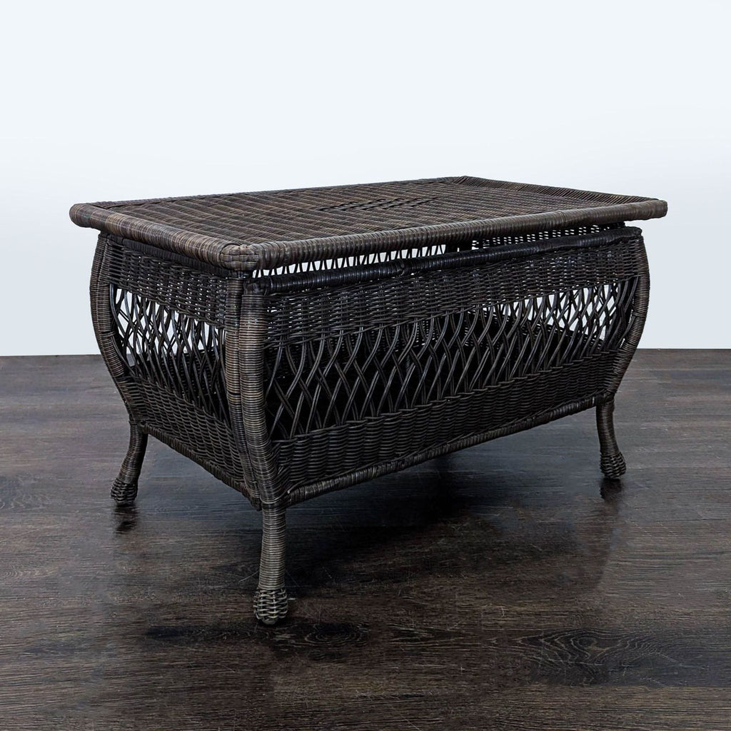 Elegant rectangular coffee table featuring a woven design, curved legs, and a spacious surface for drinks or decor.