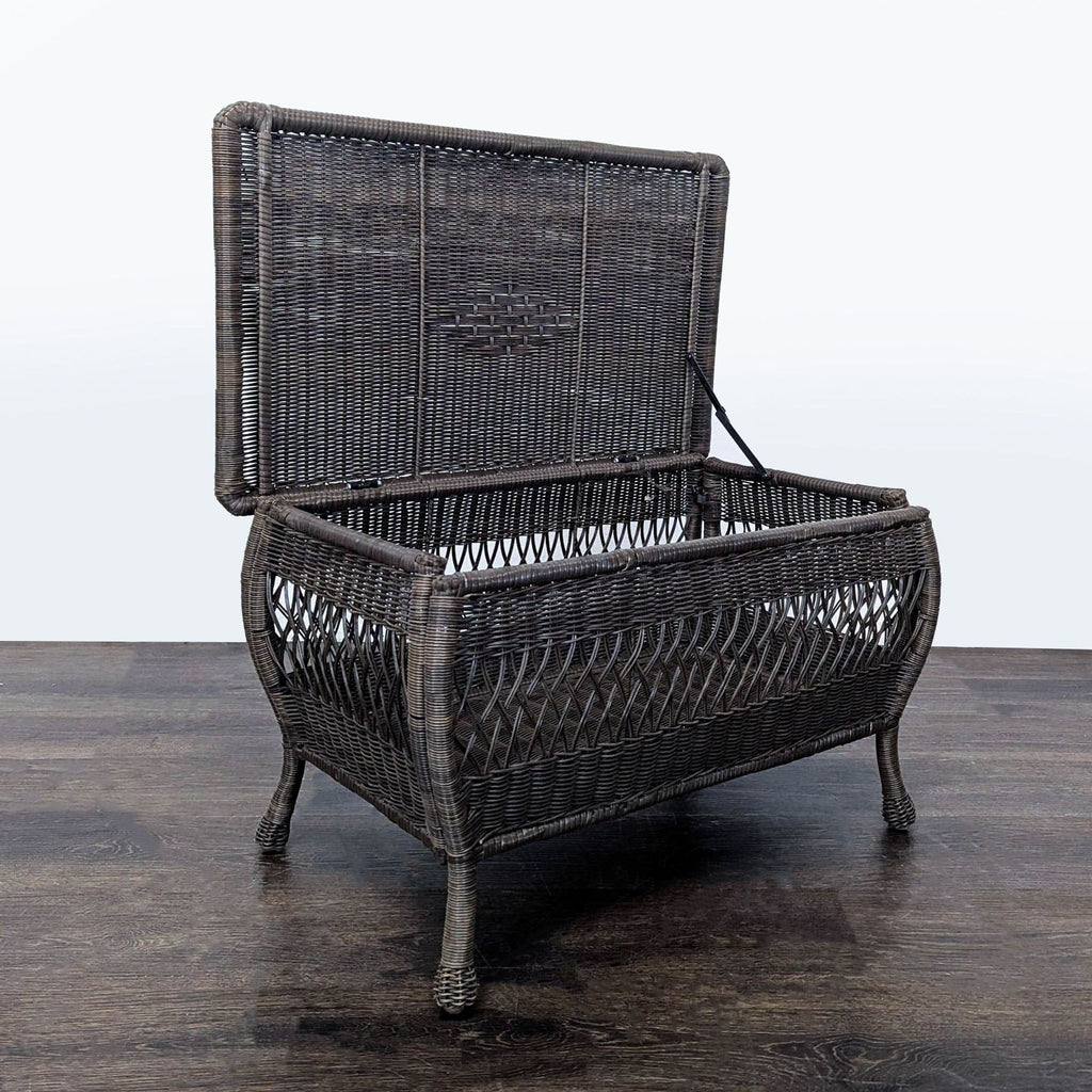 Stylish wicker coffee table in dark brown with a roomy top and sturdy woven frame, ideal for patios or living rooms.