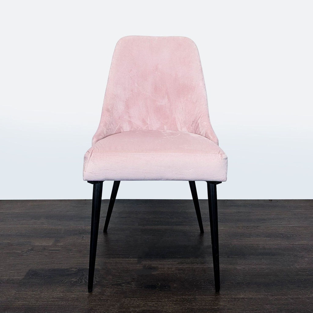 Pier 1 dining chair with sleek metal legs, perfect for modern dining spaces.