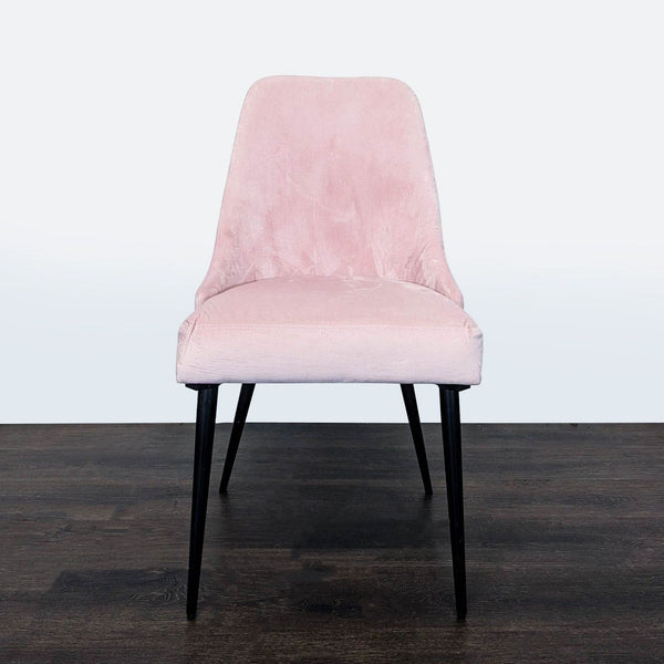 Pier 1 dining chair with sleek metal legs, perfect for modern dining spaces.