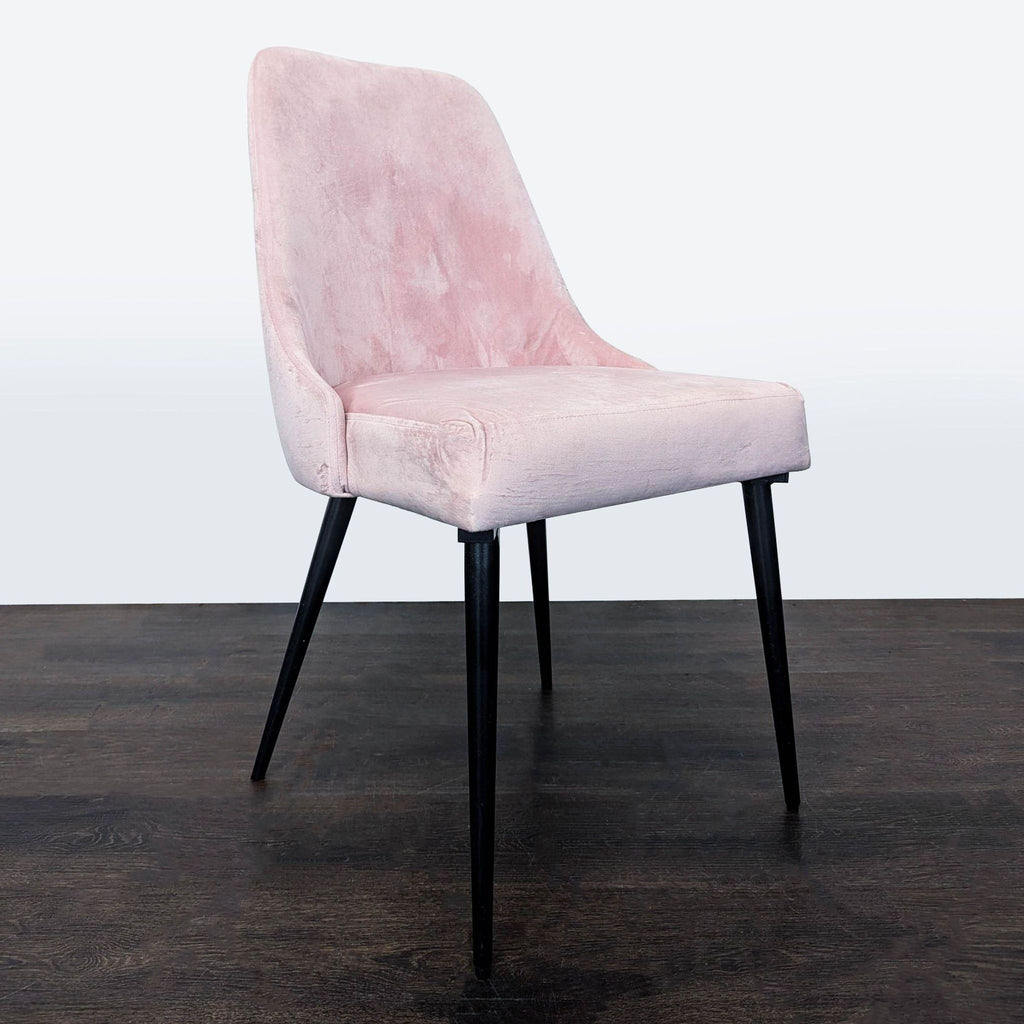 Metal-legged Pier 1 dining chair, combining sturdy construction with stylish design.