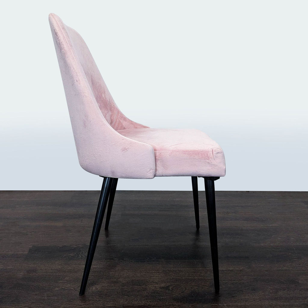 Dining chair from Pier 1 featuring metal legs, ideal for contemporary dining rooms.