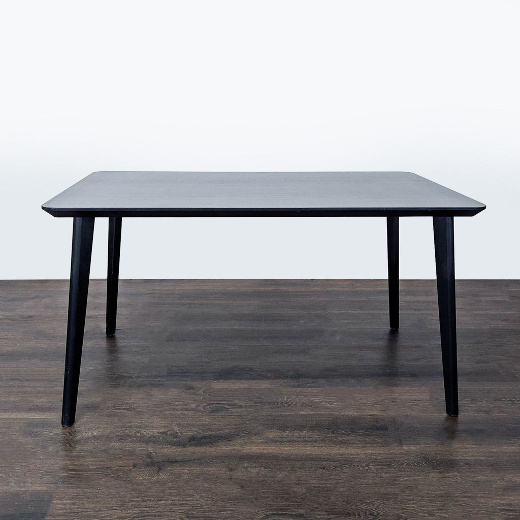 Ikea LISABO dining table with accordion-shaped fibreboard top and solid wood legs, designed by K and M Hagberg.