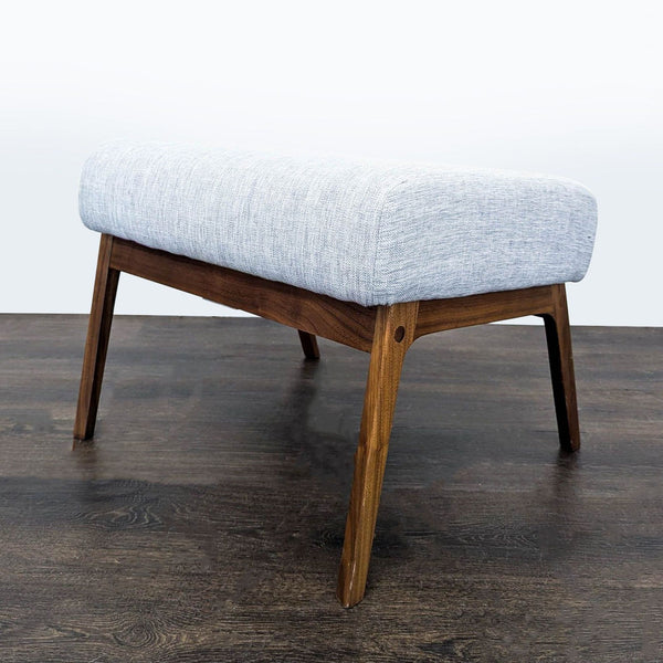 Ergonomic stool with a black walnut frame by Article, from the Stools, Ottomans & Benches collection.  