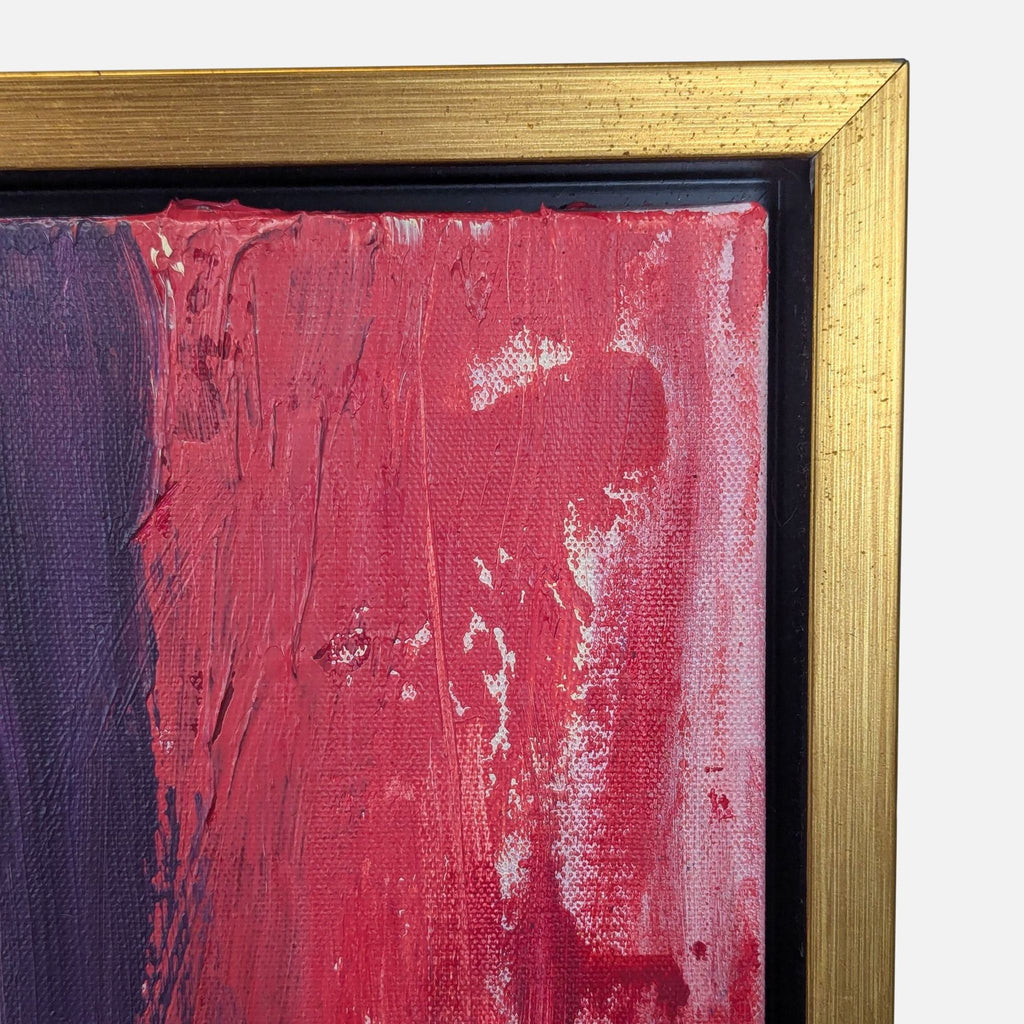 Expressive blue and red abstract artwork from Vybe Interiors, in a gold frame for contemporary spaces.