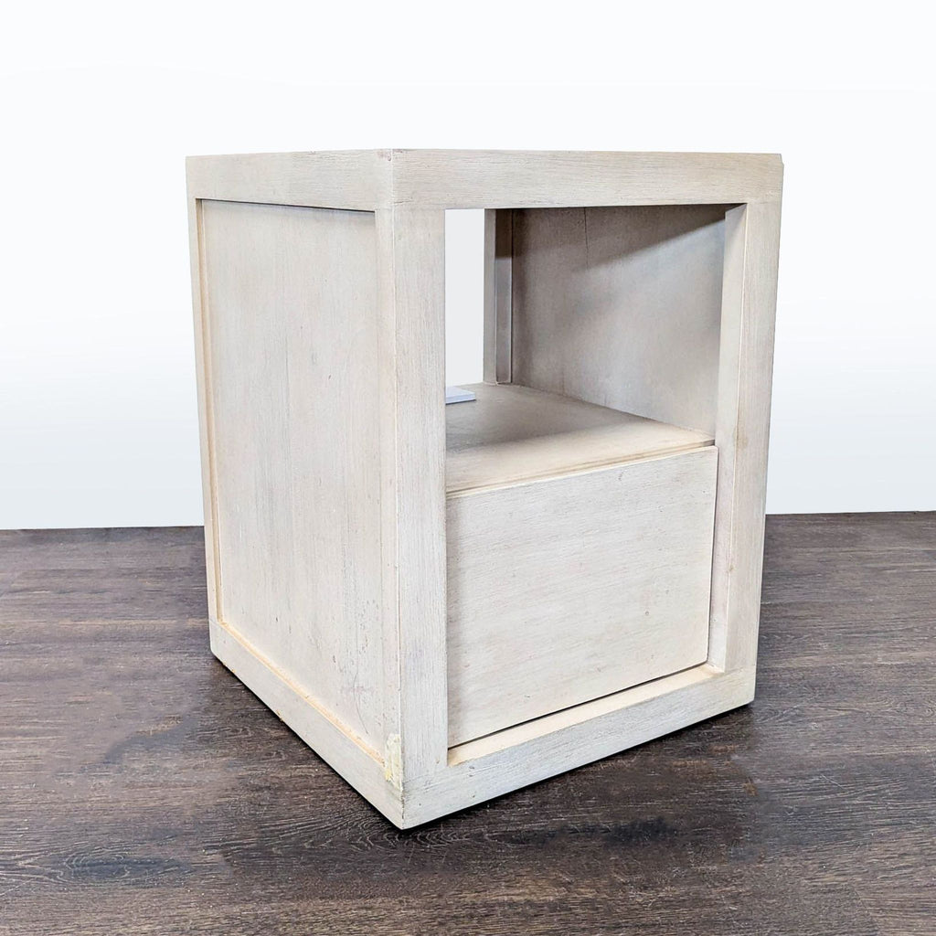 End table in biscotti finish from Pottery Barn, with one drawer and open shelf, solid mango wood.
