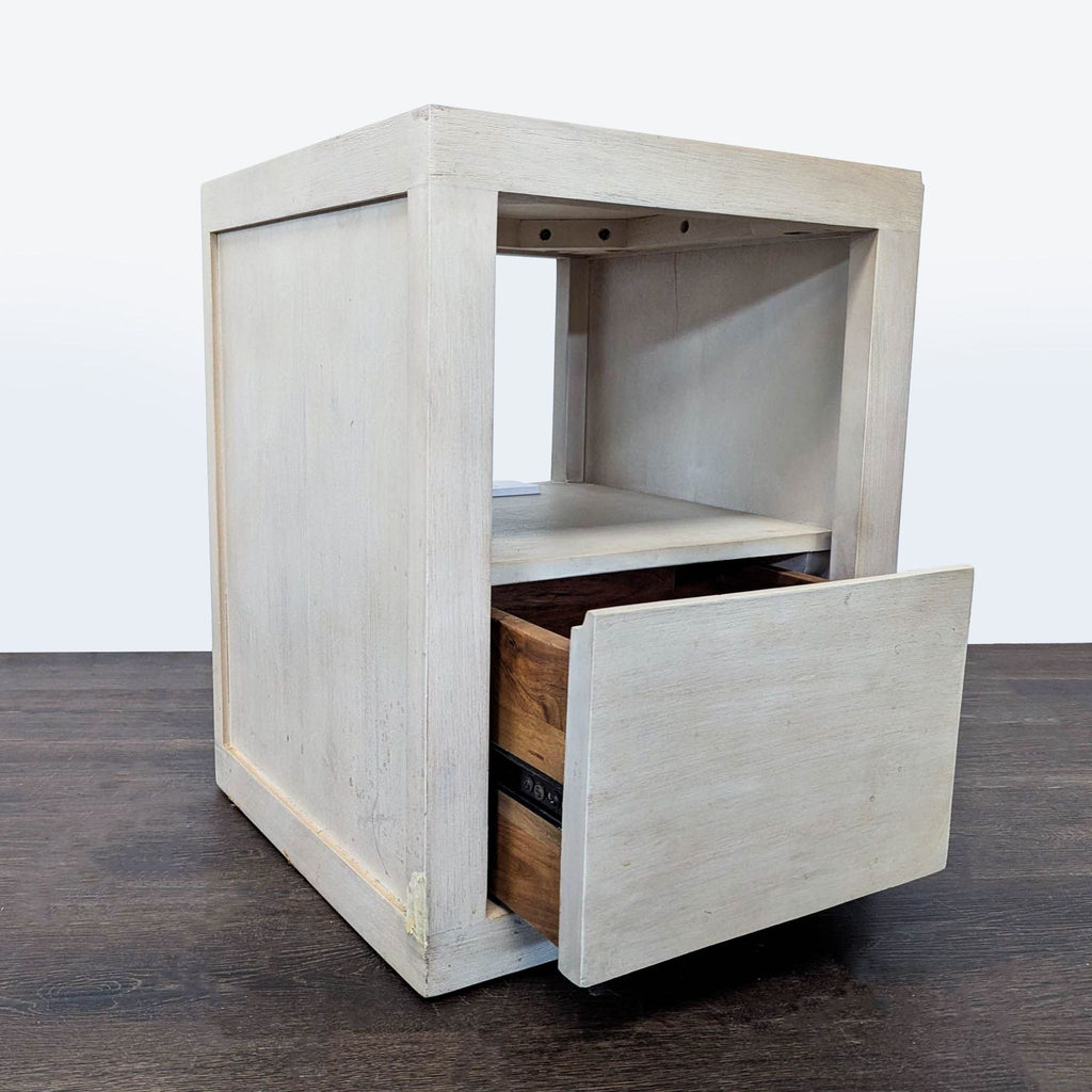 Solid mango wood end table by Pottery Barn featuring one drawer and an open shelf, biscotti finish.
