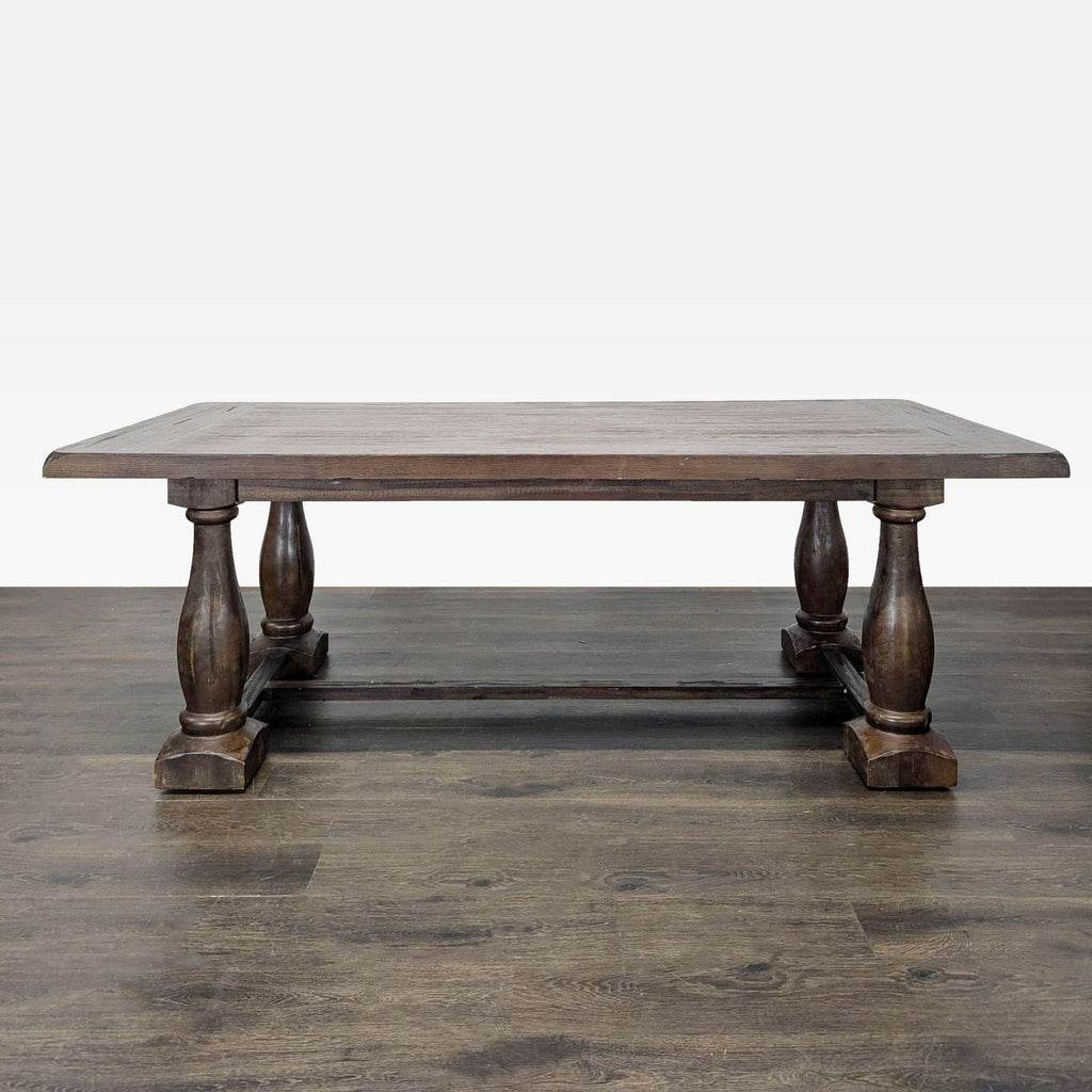 Large solid wood dining table and six chairs, mixing wooden seats and cushioned upholstered ends.
