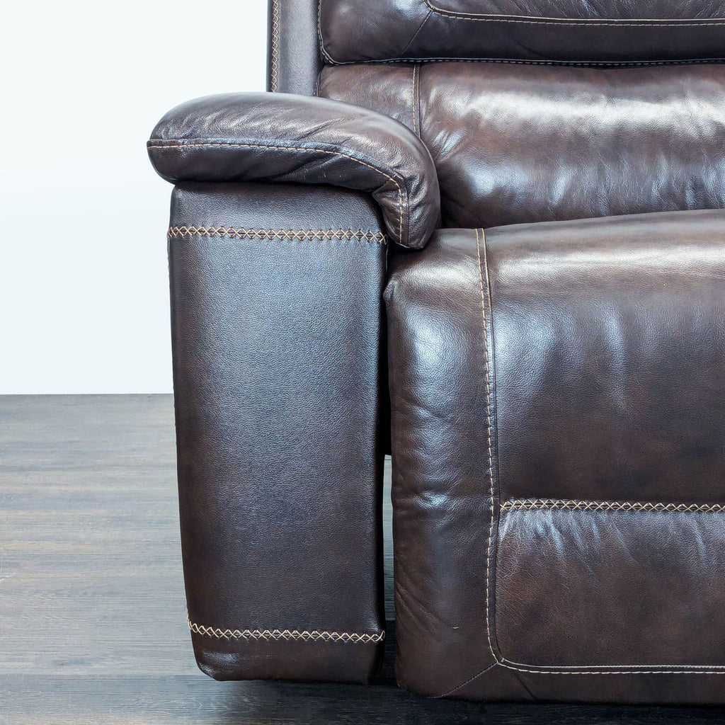 Brown Leather Reclining Loveseat with Plush Cushioning and Wide Armrests - Accepted Offer (30.88% discount)