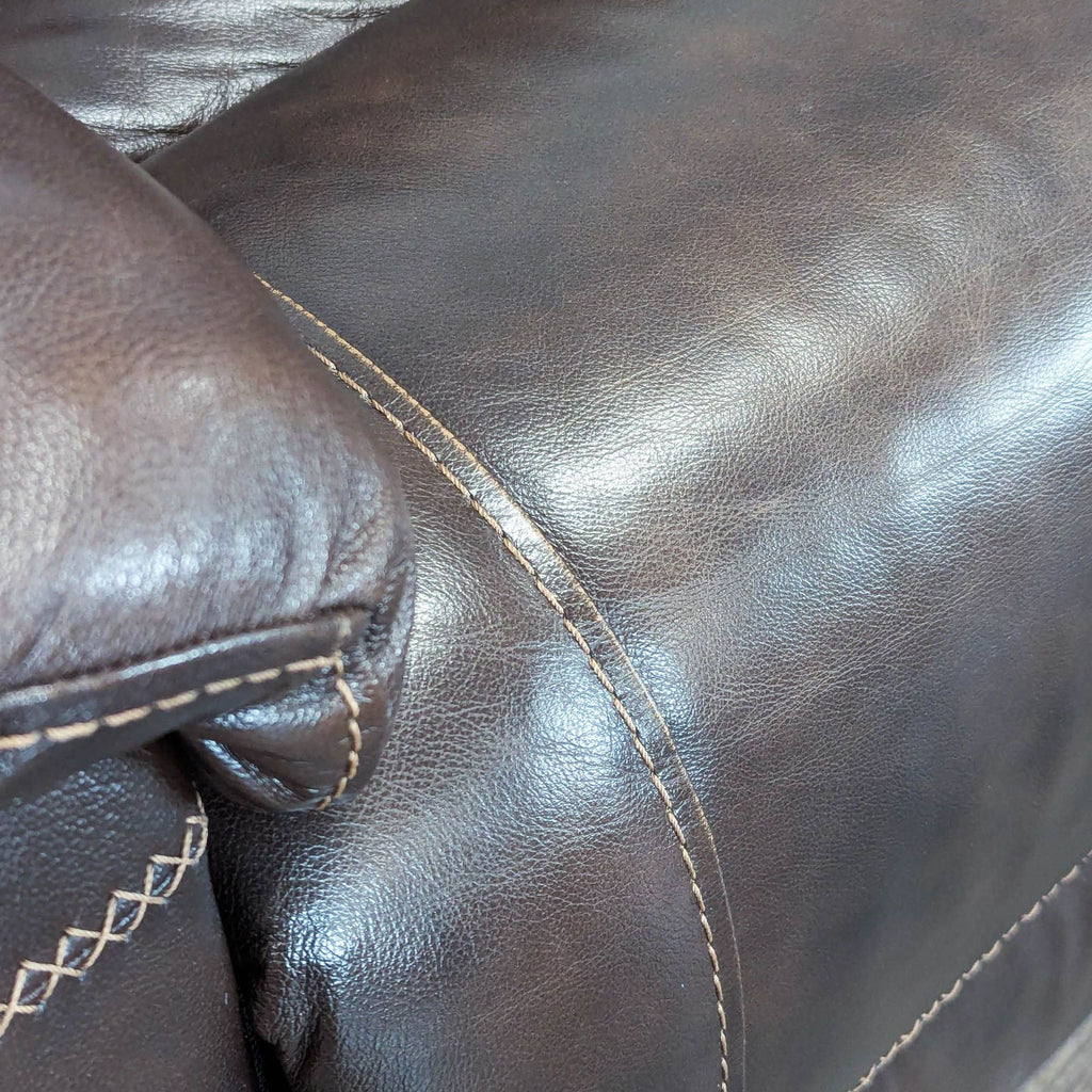 Brown Leather Reclining Loveseat with Plush Cushioning and Wide Armrests - Accepted Offer (30.88% discount)