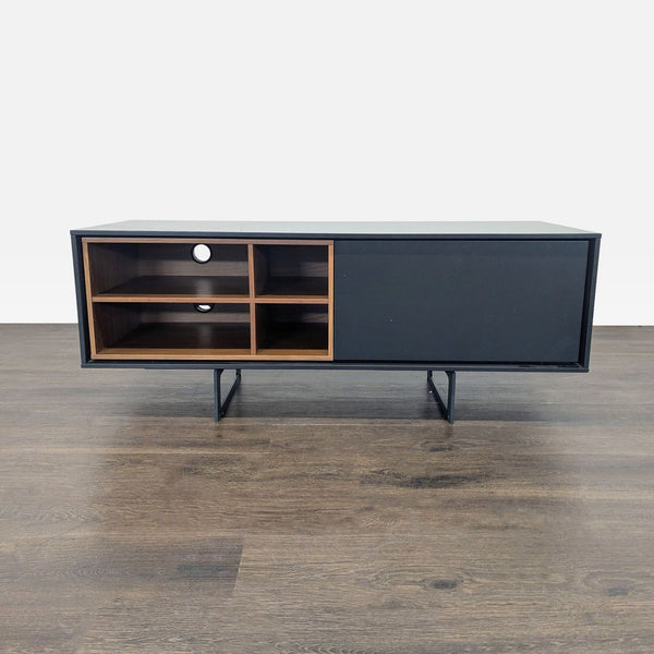 Entertainment center with open-frame steel base, wood veneer and lacquer finish, open cubby, and cabinet.