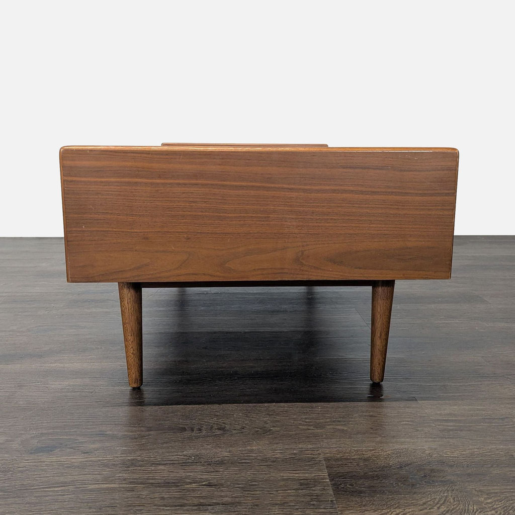 West Elm coffee table features a sleek walnut finish, marble accent, and versatile lift-top.