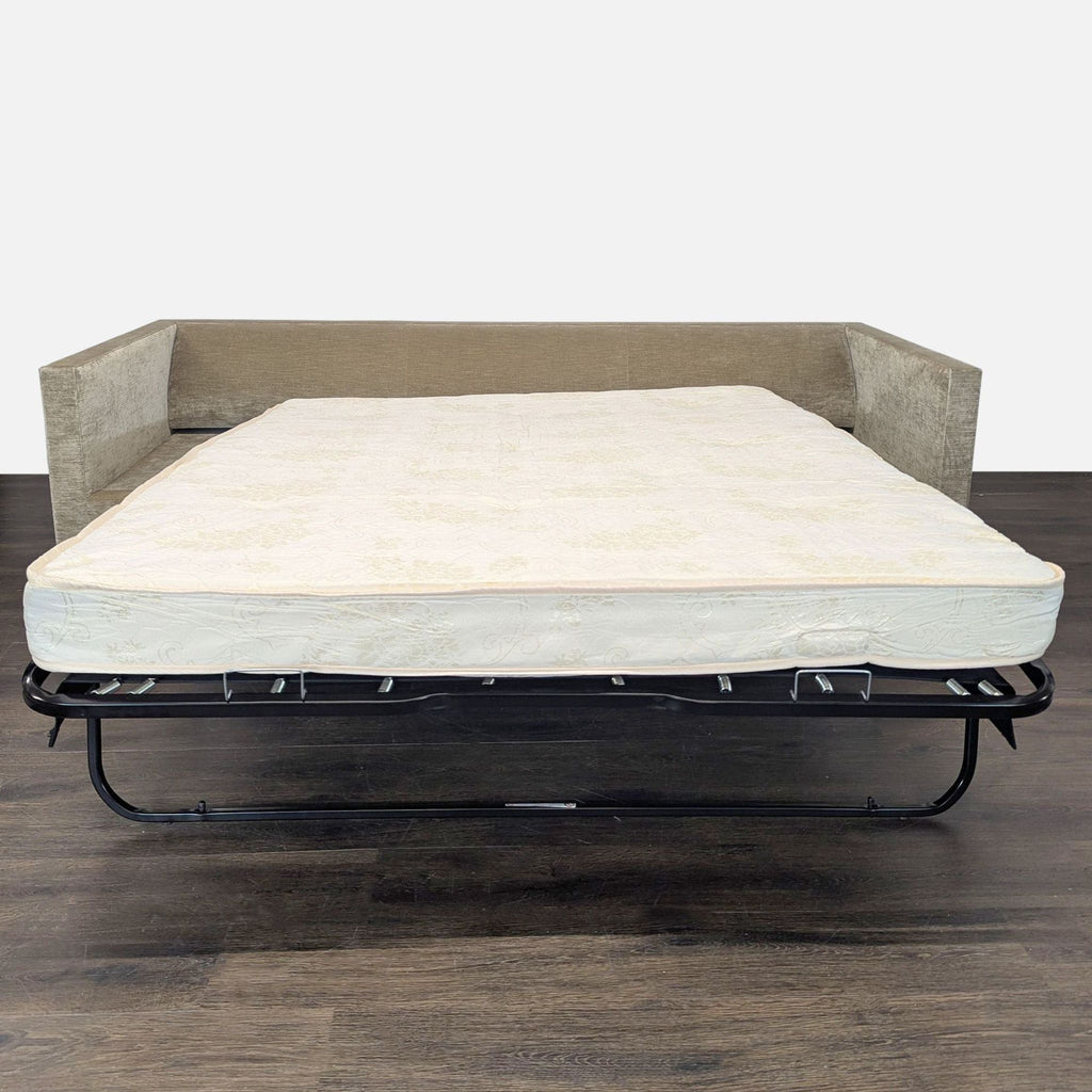 Modern sleeper sofa with textured upholstery, deep removable cushions, and black wood feet, by Leggett & Platt.