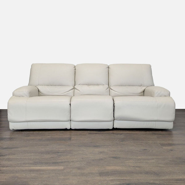 Modern Ikea 3-seat recliner sofa in soft cream leather, featuring plush cushioning and a clean, stylish design.