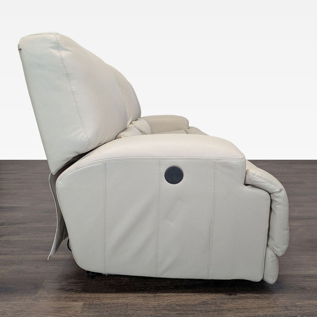 Ikea 3-seat cream recliner sofa with cushioned comfort and durable build, perfect for stylish, relaxing spaces.