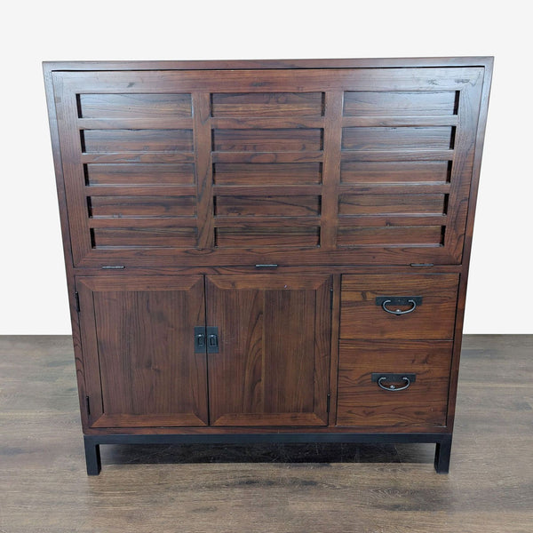 1. Modern Room & Board Maria Yee desk with folding top, open shelves, drawers, and cabinet in warm wood finish.  
